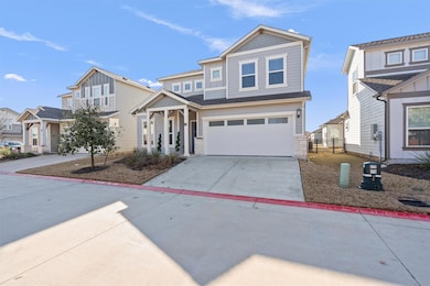 View of front of house with a garage, concrete dr