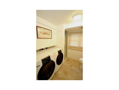 Laundry Area. Laundry with half bath/shower stall