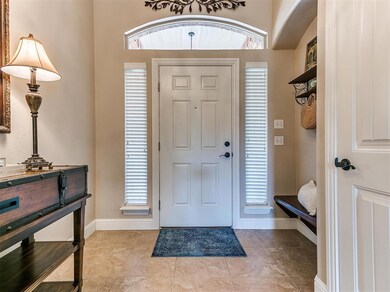 Foyer entrance with a healthy amount of sunlight a