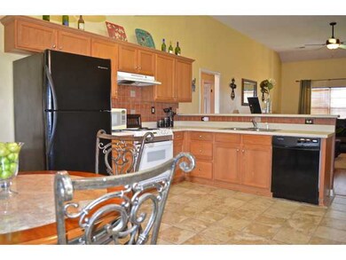 Plenty of cabinet space and a full pantry too!