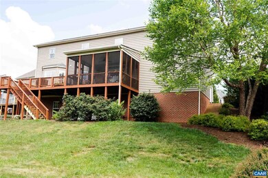 Large screened in porch and open deck above an agg