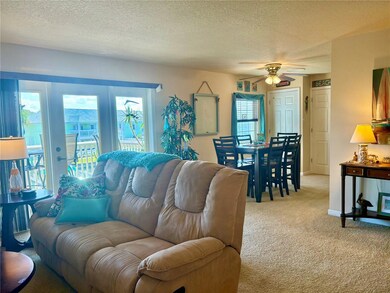 Open living/dining layout with scenic waterviews