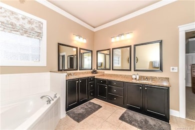 Large master bathroom with two vanities, updated m