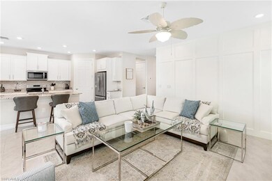Living room featuring ceiling fan