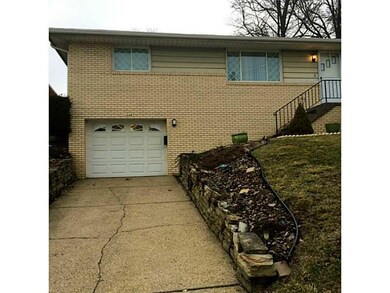 Exterior Front. BeautifulYellow home recently poin