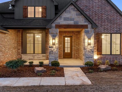 View of exterior entry featuring french doors