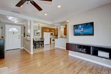 Large, open layout between the family room and kit