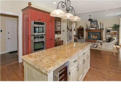 Island with granite, wine cooler