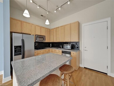 Kitchen with view of the front door