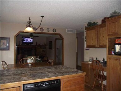 Kitchen opens to living room