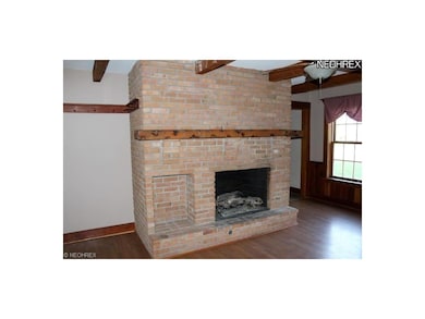 Fireplace in the hearth room.  How cozy this room 
