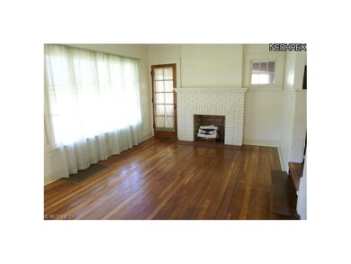 Living room with decorative fireplace