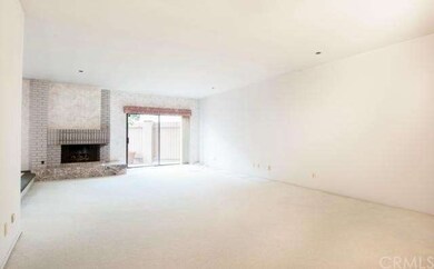 Spacious living room with fireplace