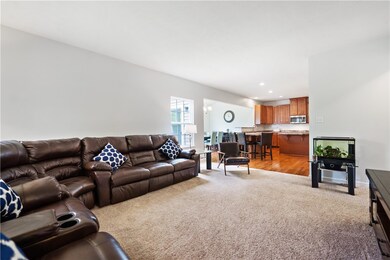 The open concept from family room to kitchen makes