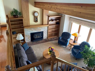Living room with gas fireplace.
