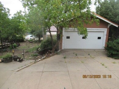 garage and lower level backyard