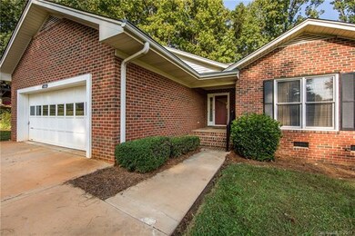 Covered entrance, 2 car garage, lovely street