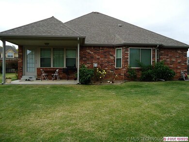 Covered patio on east side of home.