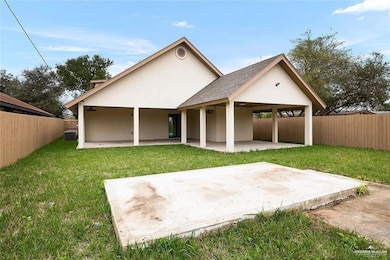 Rear view of property with a patio, a fenced backyard, a yard, and cooling unit