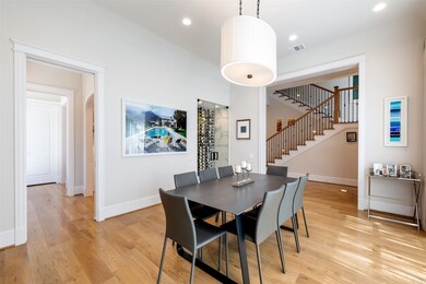 The formal dining is large enough for an 8+ person seated table, shown here with a 6 person table you can see there is plenty of room for more.