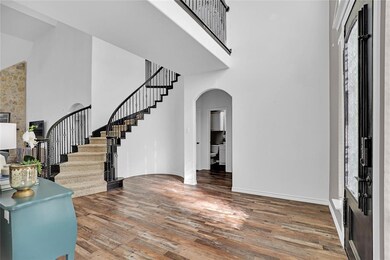 Step into the dramatic foyer.