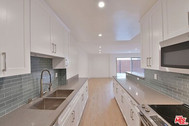 136 S Palm Dr unit 103, Beverly Hills, CA 90212 - photo 2