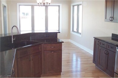 Exterior Front. Kitchen with dining area near by.