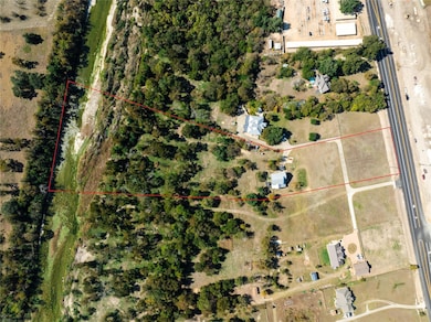 Aerial view with estimated outline of property