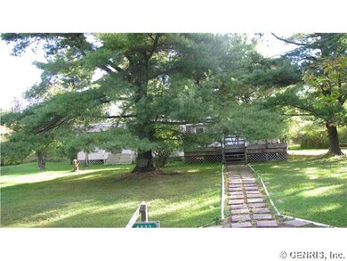 Exterior Front. Front walk way from driveway.