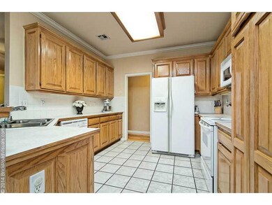 Kitchen. Custom oak cabinets and tons of counter s
