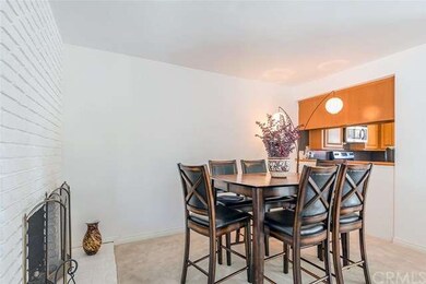 Dining room and breakfast bar with cozy fireplace