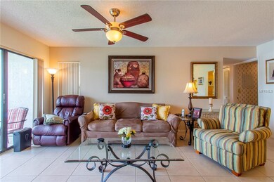 Living room with access to screen porch.