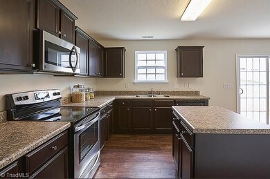 Kitchen with island and breakfast nook! ALL Stainless Steel appliances INCLUDED!
