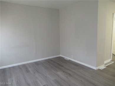 Unfurnished room featuring light hardwood / wood-style flooring