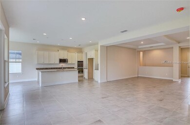 Open concept kitchen, living room, dining room and