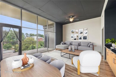 Living room with a ceiling fan and light wood-type flooring