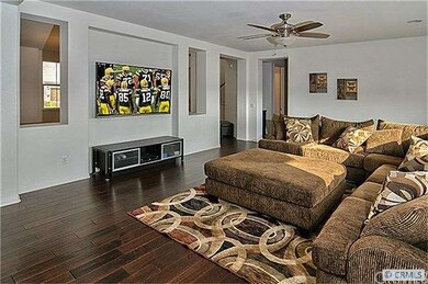 Media niche in family room-shown with a 70