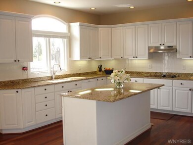 Kitchen New Granite Counters, Cherry Hardwood Floo