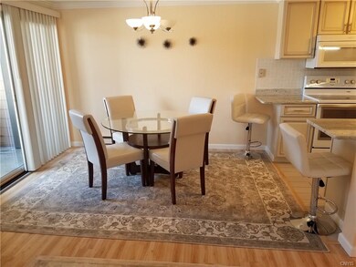Glass and cherry dining set with Napa backed chair