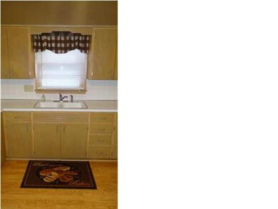 View of the kitchen and the kitchen window.