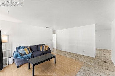 Living room featuring wood finished floors