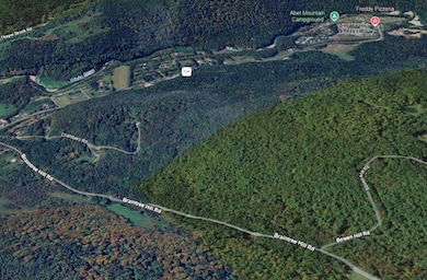 Showing private Road of 12A to back and top of property