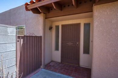Front Door & Gate To Backyard