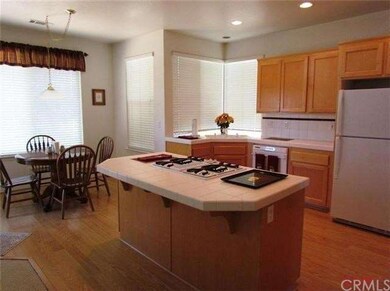 Kitchen opens to family room and has a sunny break