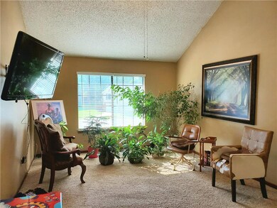 Second living room with vaulted ceilings