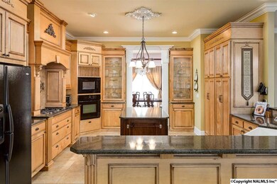 There are wonderful built-ins, pull out shelving, and pantry space.