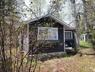 View of home's exterior with a playground