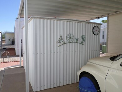 UNATTACHED SHED IN CARPORT