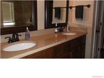 The master bath is lovely with designer mirrors, r
