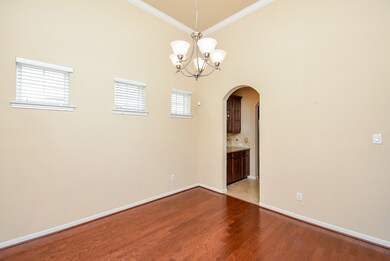 Butlers pantry leads to kitchen, great for enterta